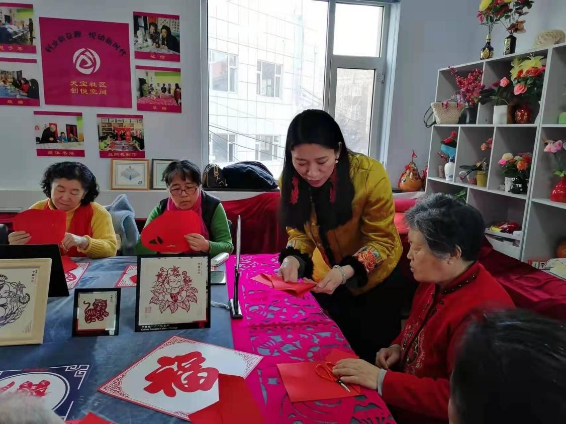 新春剪纸送来浓浓年味 省民协开展“我们的中国梦”文化进万家活动